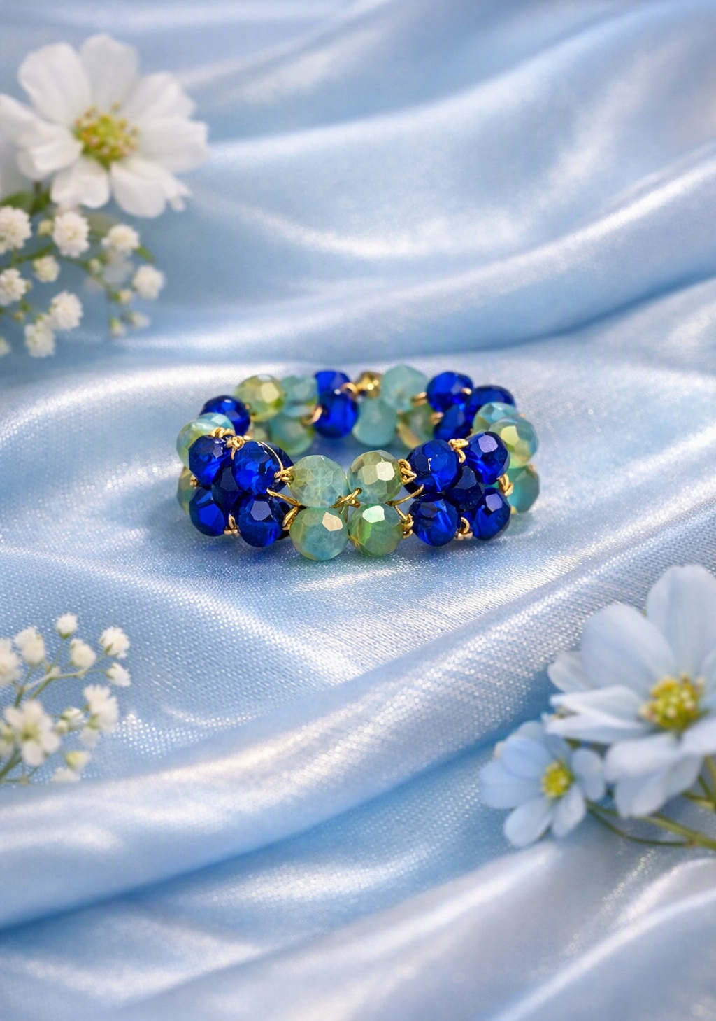 Bague en perles coloris bleu clair